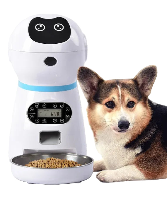 Dog next to a white pet feeder with a digital display in a home setting.