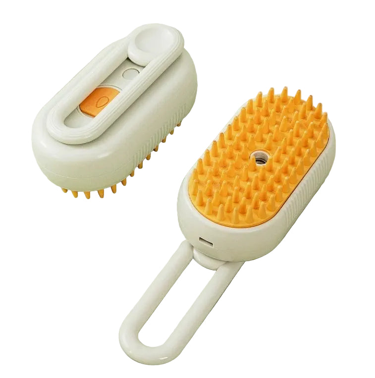 White and orange grooming brush on a light gray surface