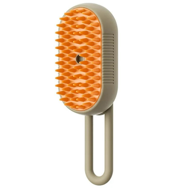 Pet grooming brush with orange bristles and beige handle on a white background