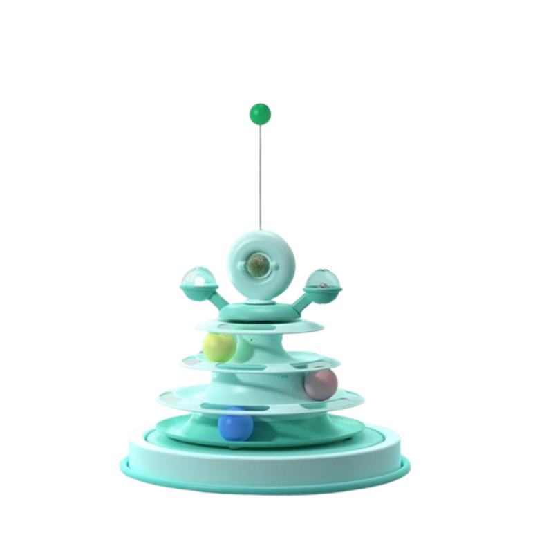 A mint green and white tiered toy with a central circular target, small side platforms, and colorful balls in blue, yellow, pink, and green, isolated on a white background.