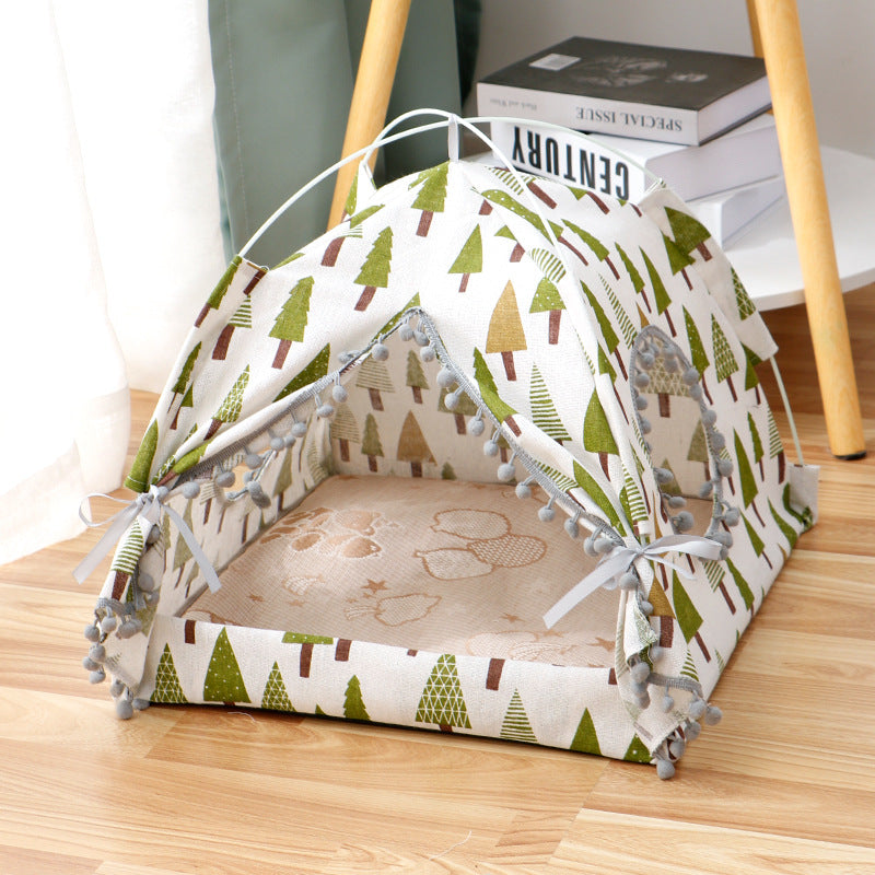 Pet tent with tree pattern on a wooden floor