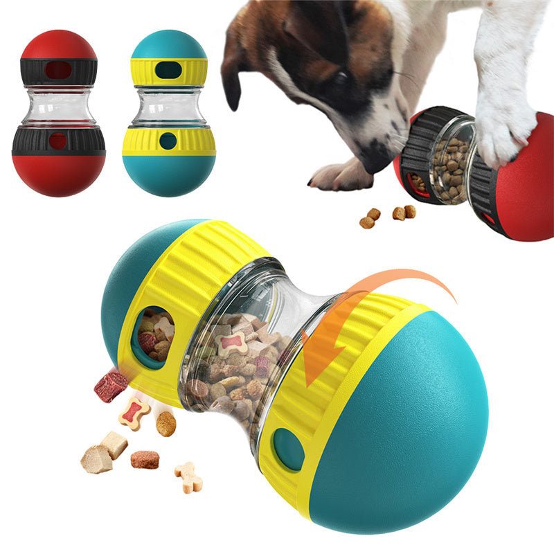 A dog toy puzzle ball shown in multiple views on a white background, with a dog partially visible at the top right reaching for a red version. The main product is a translucent clear center with yellow and teal outer sections and small circular openings; treats are visible inside and spilling out.