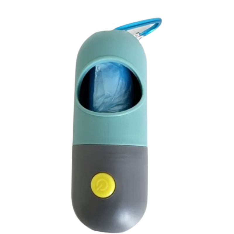 A capsule-shaped plastic bag dispenser with a light teal upper half, dark gray lower half, a yellow button, and a blue carabiner clip, shown on a plain white background.