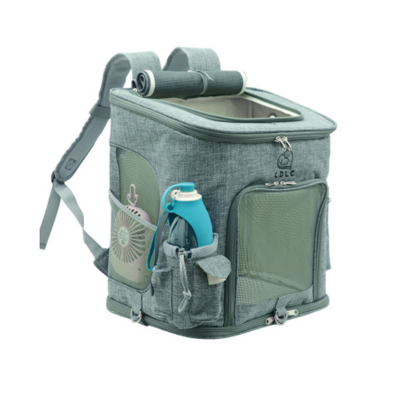 Blue pet carrier backpack with gray straps, mesh windows, and side pockets on a white background
