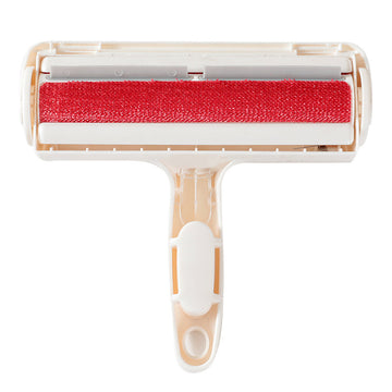 Red roller brush with beige handle on a white background