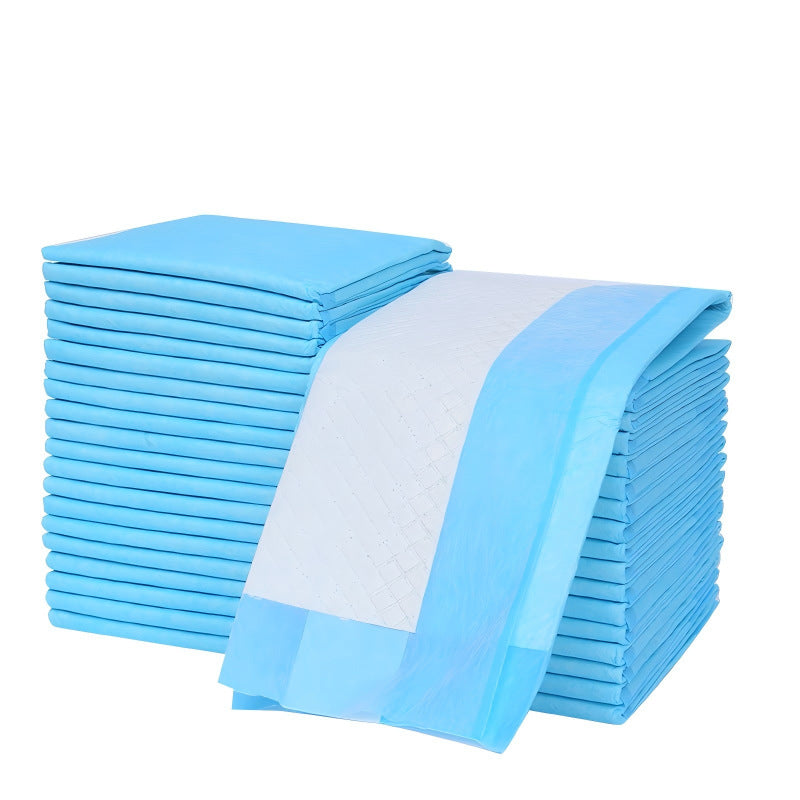 Stack of blue disposable diapers on a white background