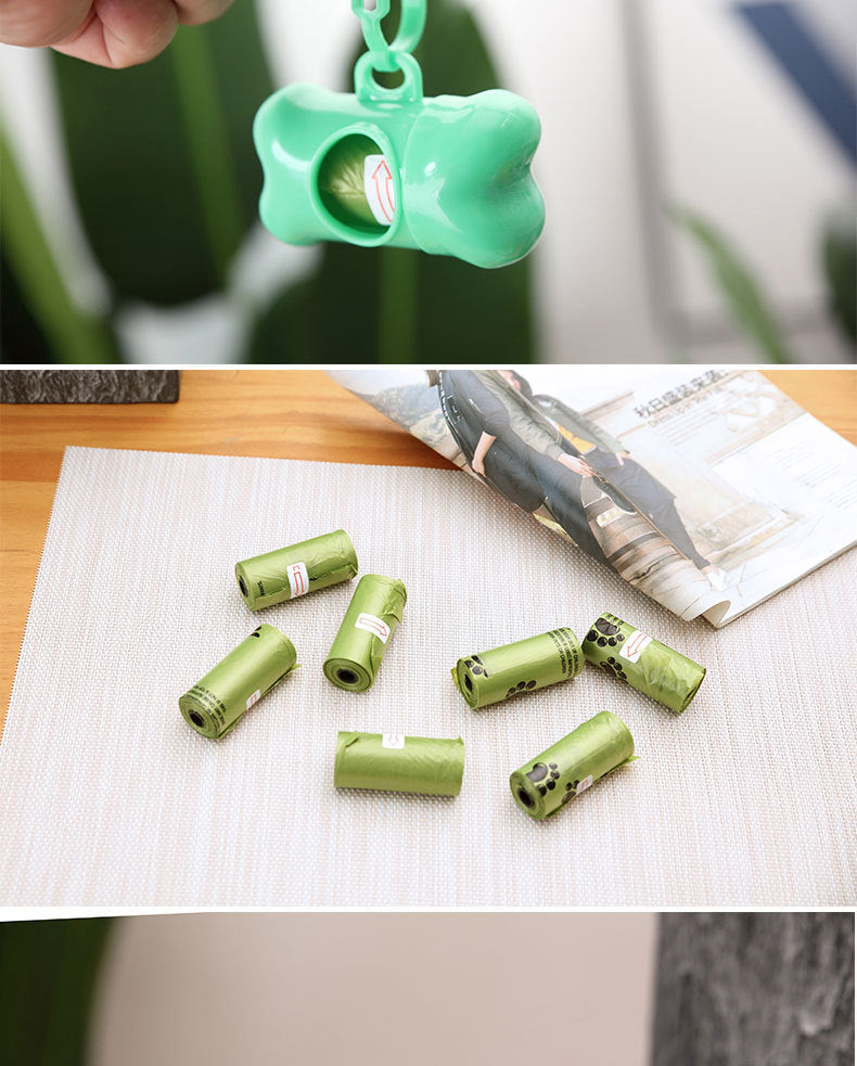Green pet waste bag dispenser with bags on a table