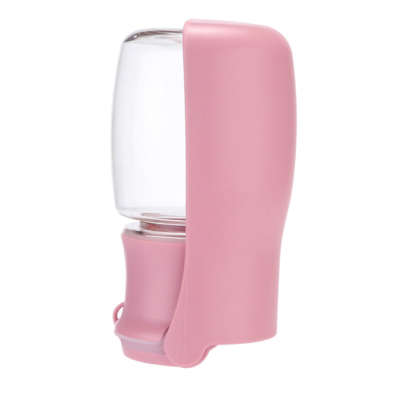 Pink pet water bottle with clear drinking chamber on a white background