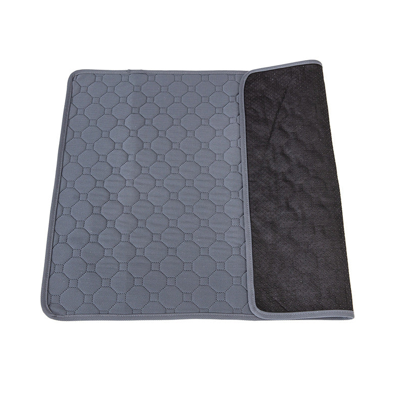 Gray quilted mat with black textured border on a white background